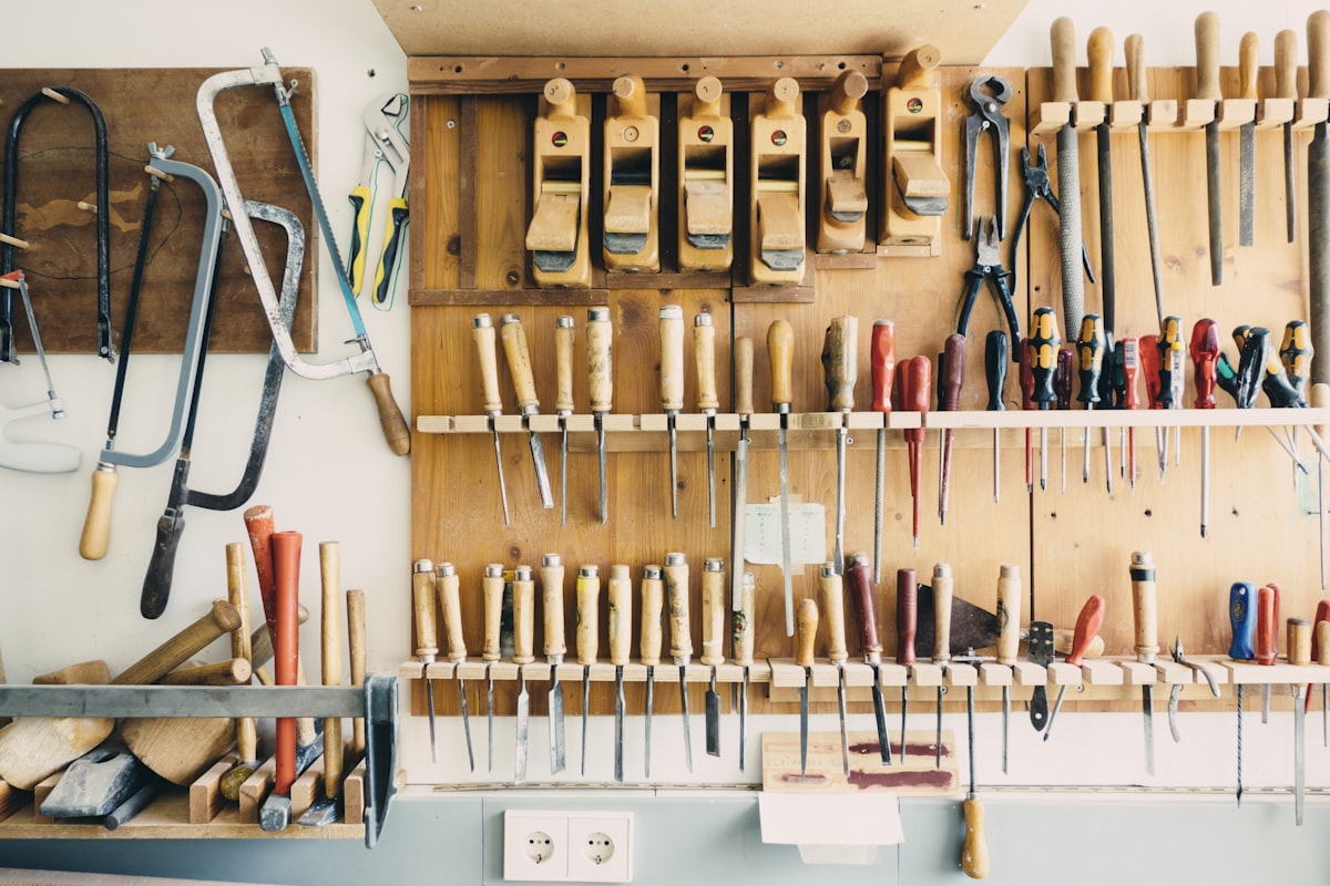 Hand tools on a maintenance workshop wall